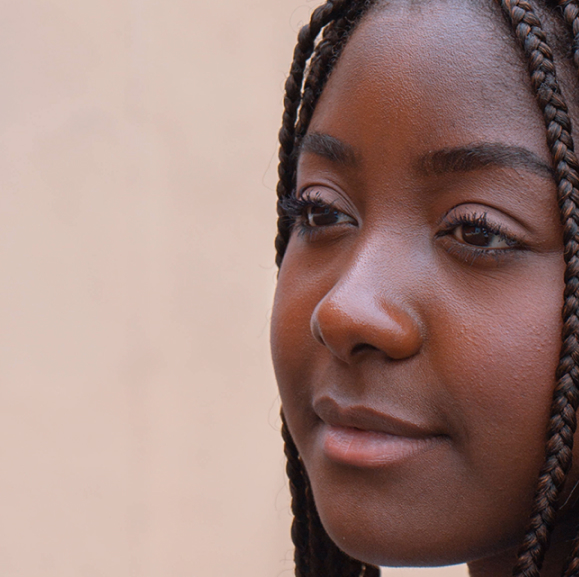 Adolescent girl looking forward