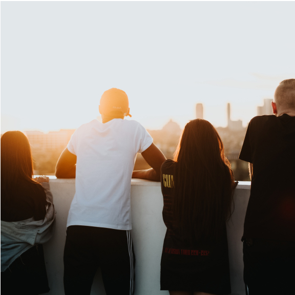 Four Teenagers Looking at Sunset