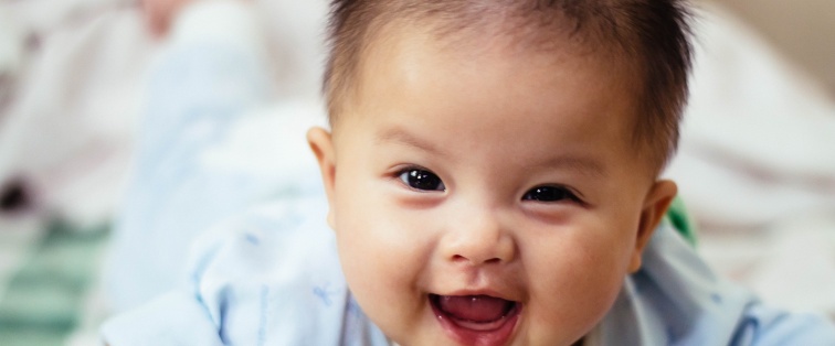 asian baby boy smiling